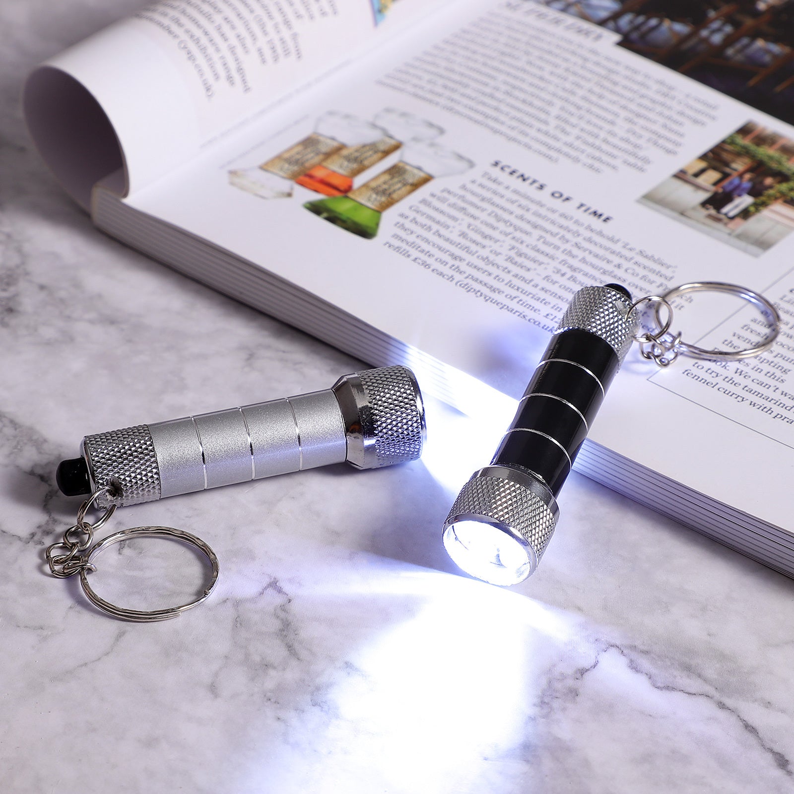 Mini flashlight outdoors, compact LED torch perfect for camping and hiking.