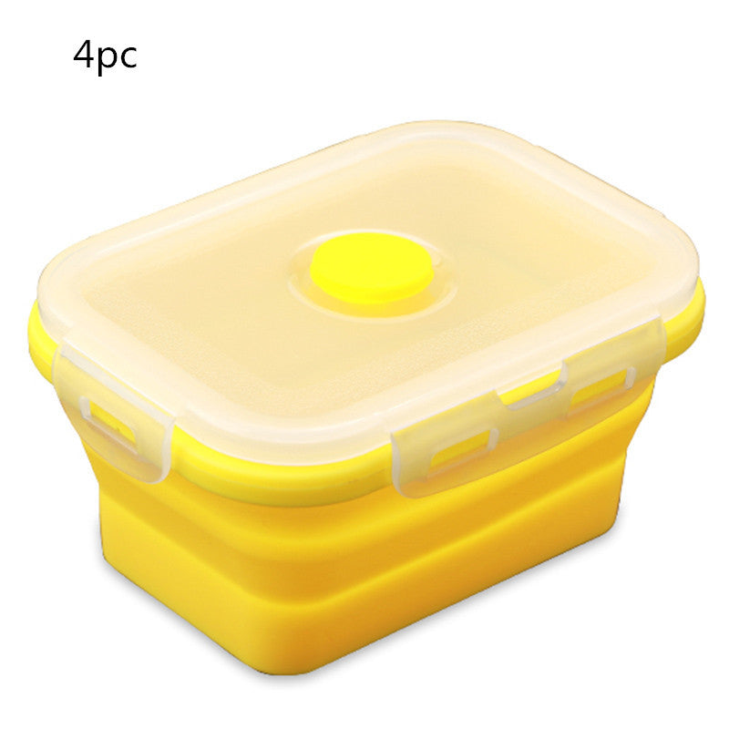 Yellow collapsible container with a lid on a white background