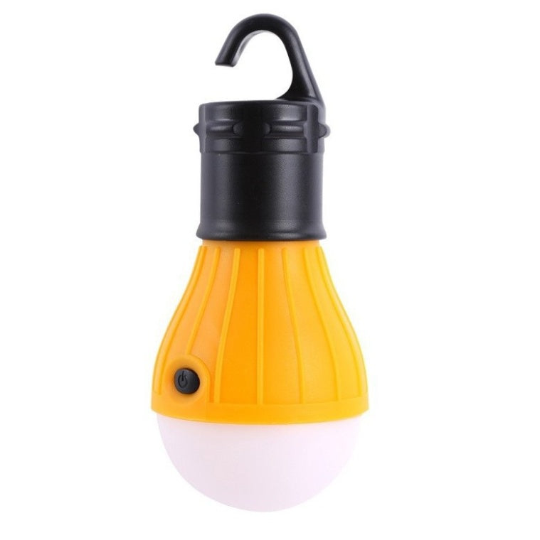 Yellow camping light bulb with black clip on a white background