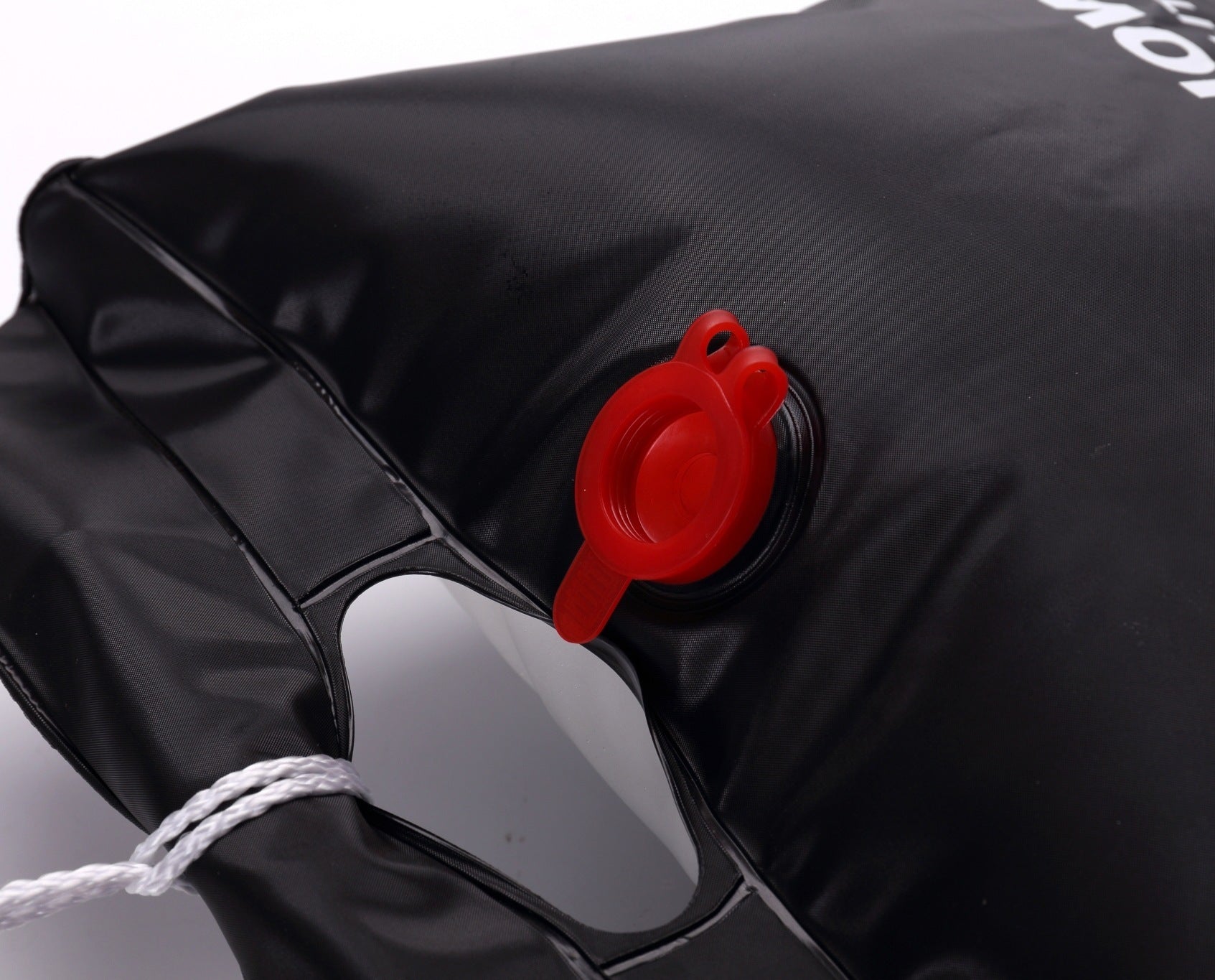 Close-up of eco PVC water bag UK hanging for camping shower
