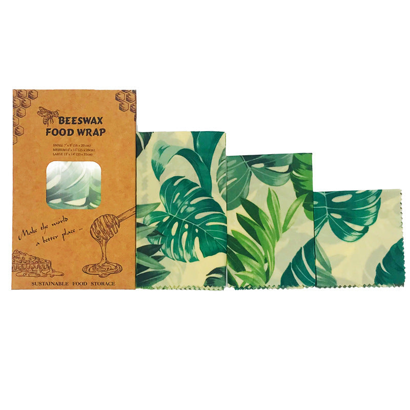 Beeswax food wrap with leaf pattern, reusable and washable covering. 
