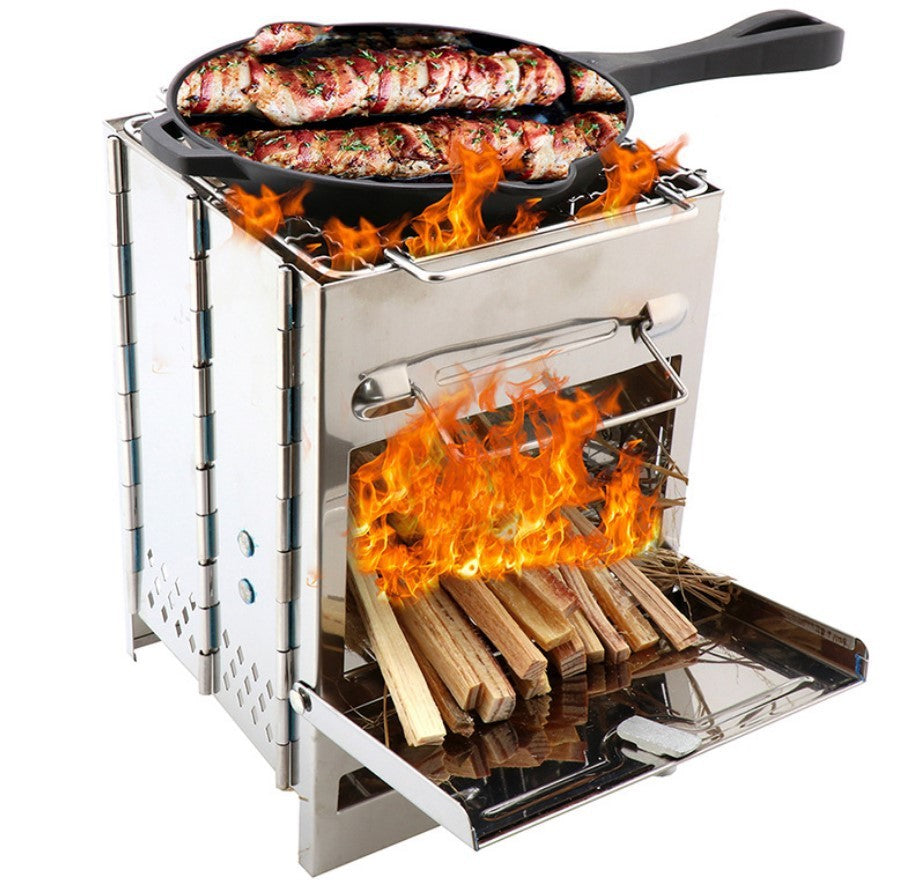 Portable stove with flames cooking sausages US camping grill