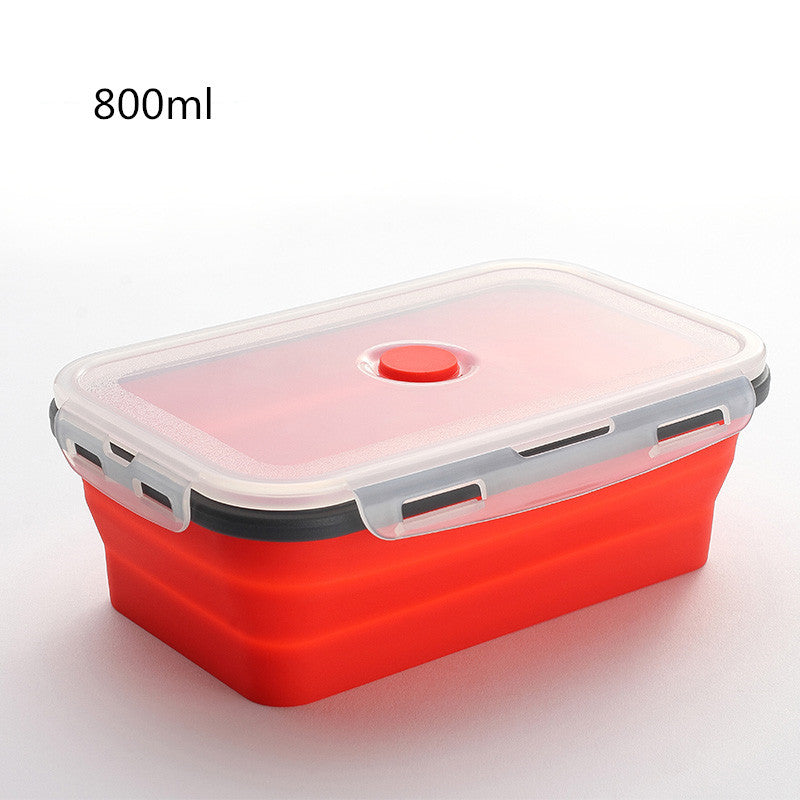 Red silicone container with a white lid on a light gray background