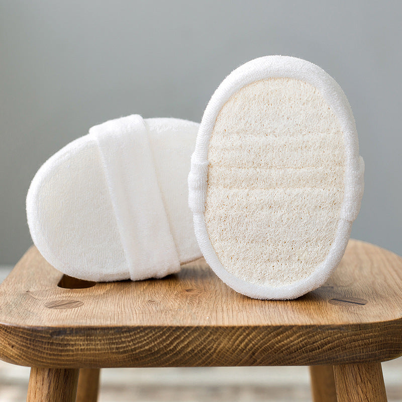 biodegradable loofah on wooden bath shelf Australia.