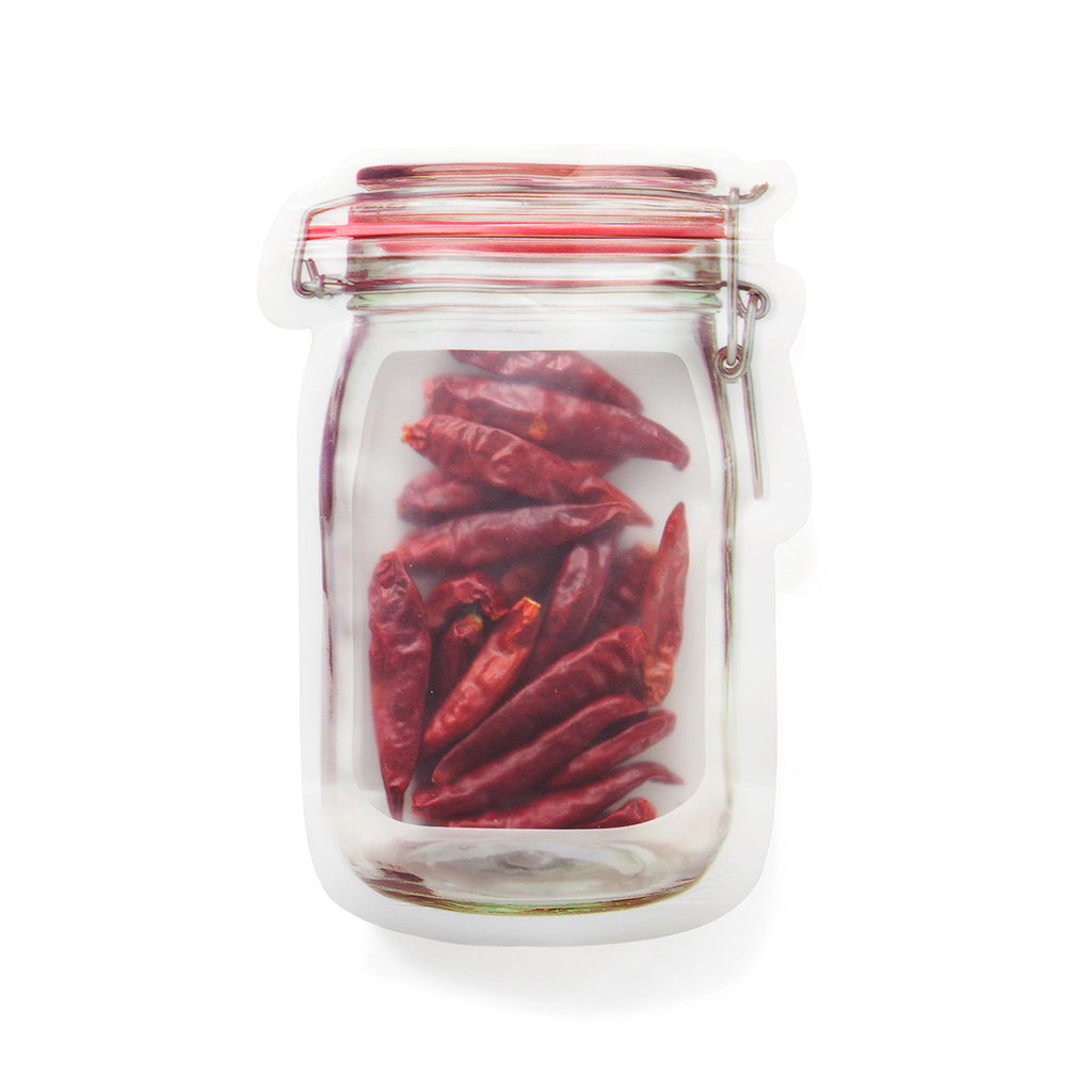 reusable snack storage bag filled with dried red chilies on a white background