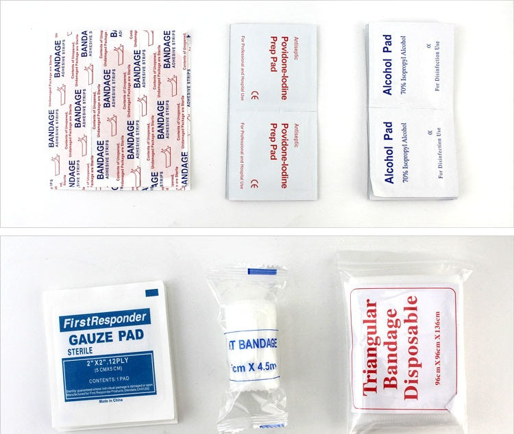 Collection of first aid supplies including bandages and alcohol pads 