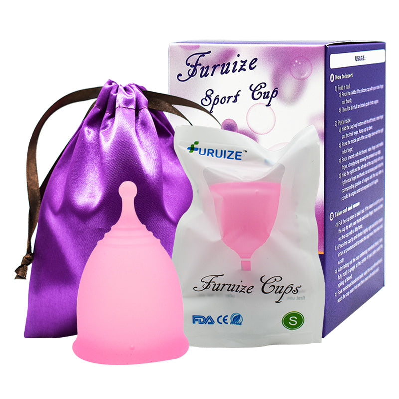 Reusable eco menstrual pink cup with purple drawstring bag and packaging
