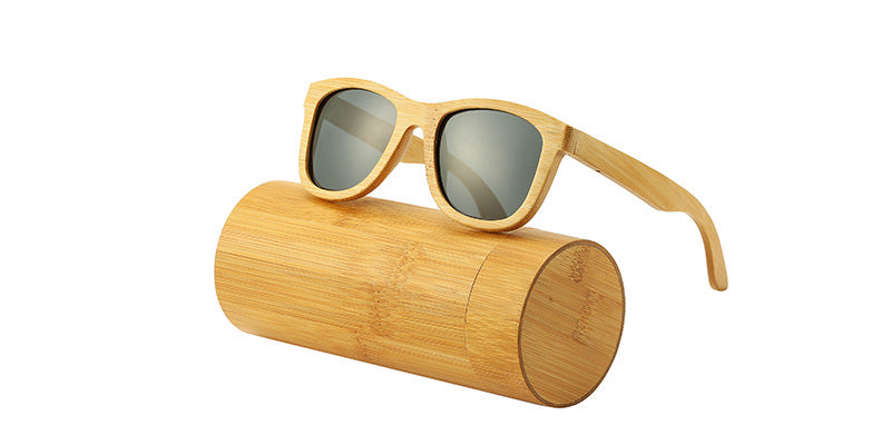 Eco bamboo sunglasses with a matching cylindrical case.