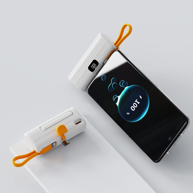 Phone with a power bank on a light gray background
