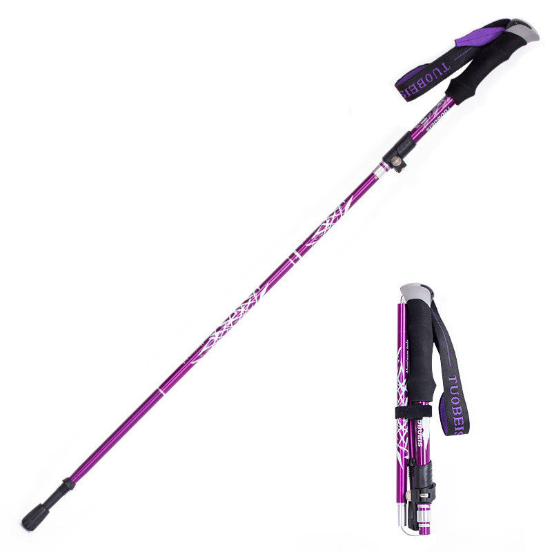 Purple folded hiking pole set packing into backpack Canada