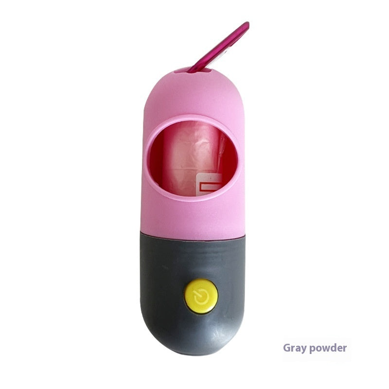 Gray and pink LED pet waste bag dispenser with a yellow button New Zealand walk