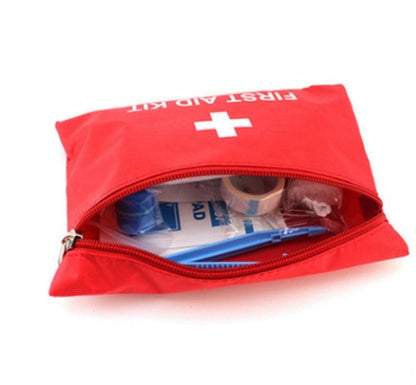 opened outdoor first aid kit US hiking essentials visible