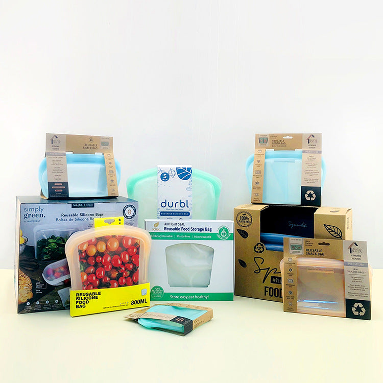 Collection of UK reusable food storage containers and packaging on a white background