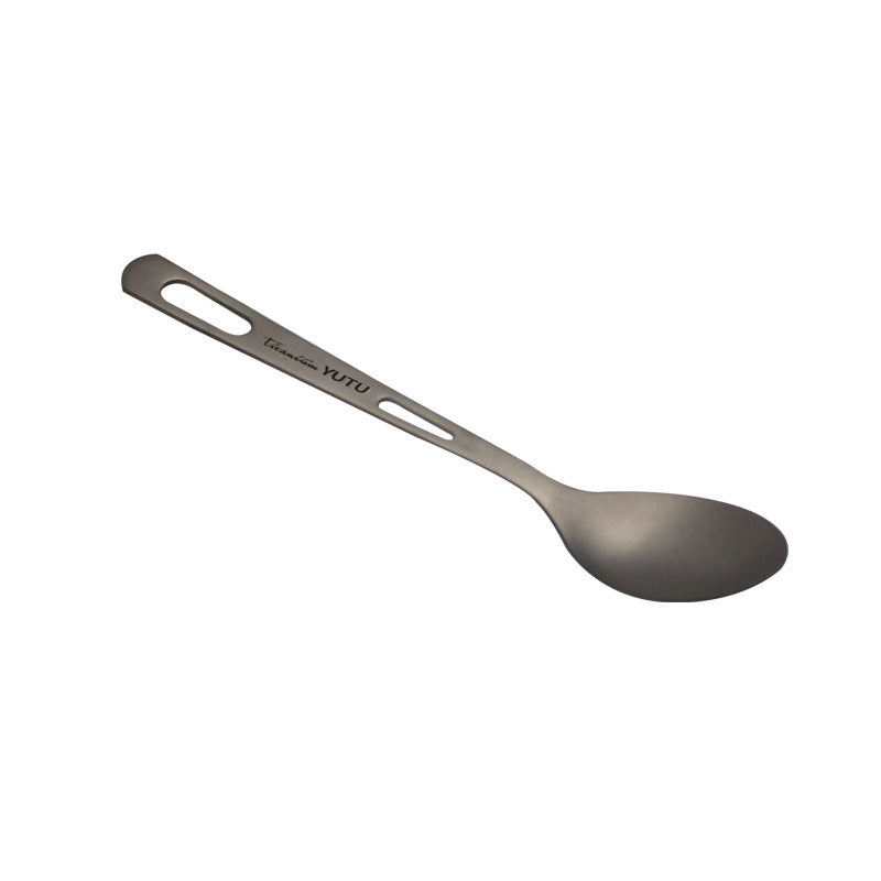 pure titanium spoon on a white background