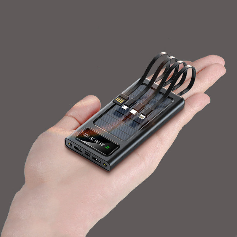 Hand holding a solar panels on a gray background UK