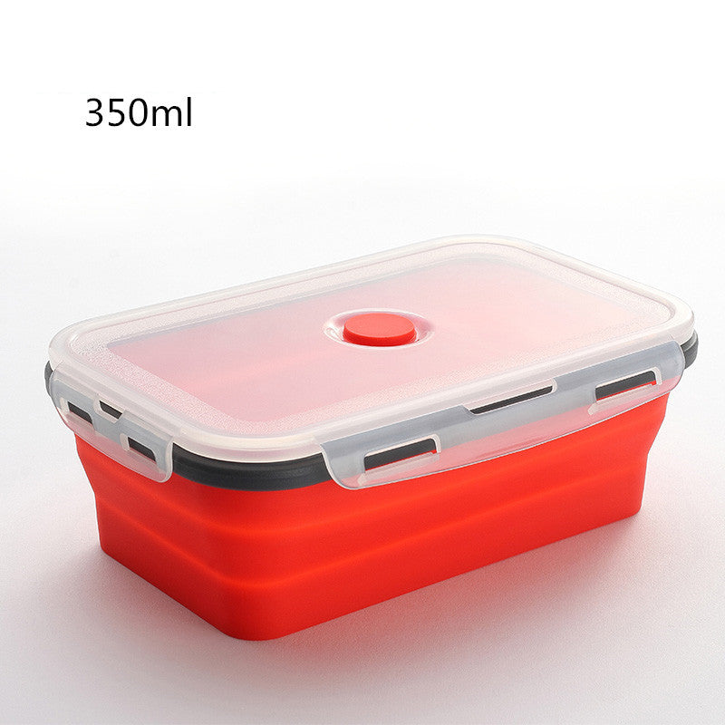 Red silicone container with a white lid on a light gray background