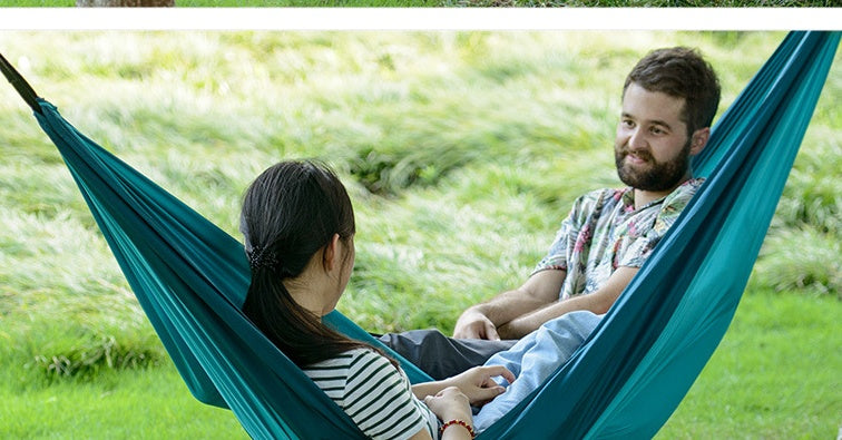 outdoor camping hammock UK setup between trees