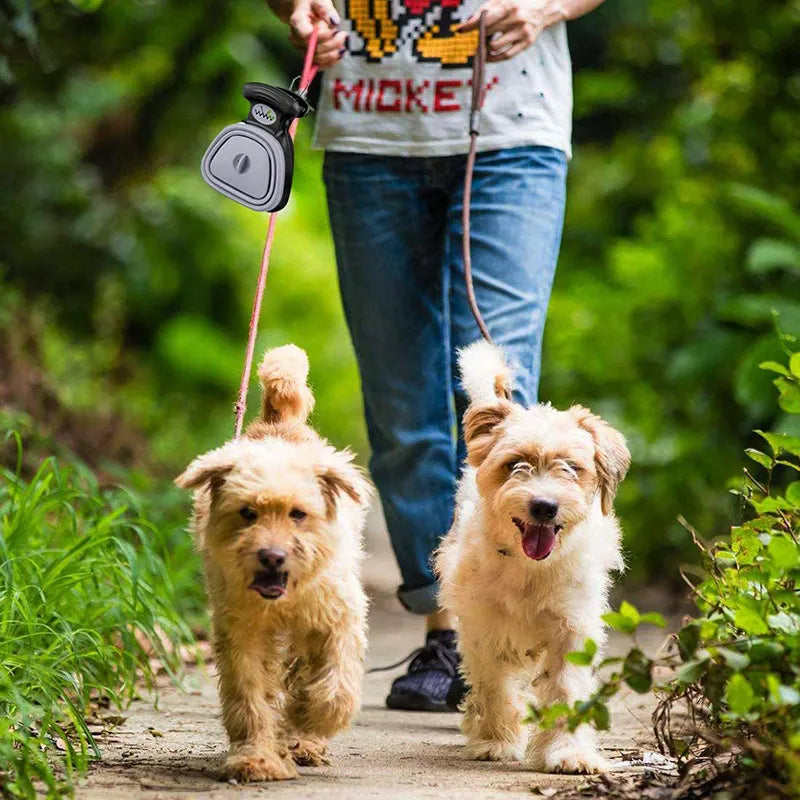 dog owner using foldable scooper Australia outing