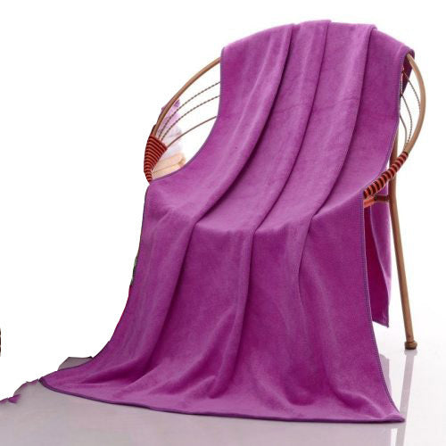 Purple nano microfiber towel draped over a wicker chair  Canada gym gear