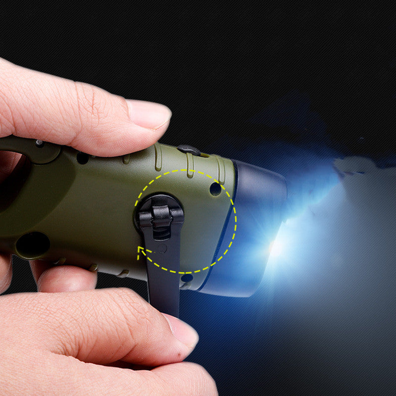 hand crank solar LED flashlight in hand US use
